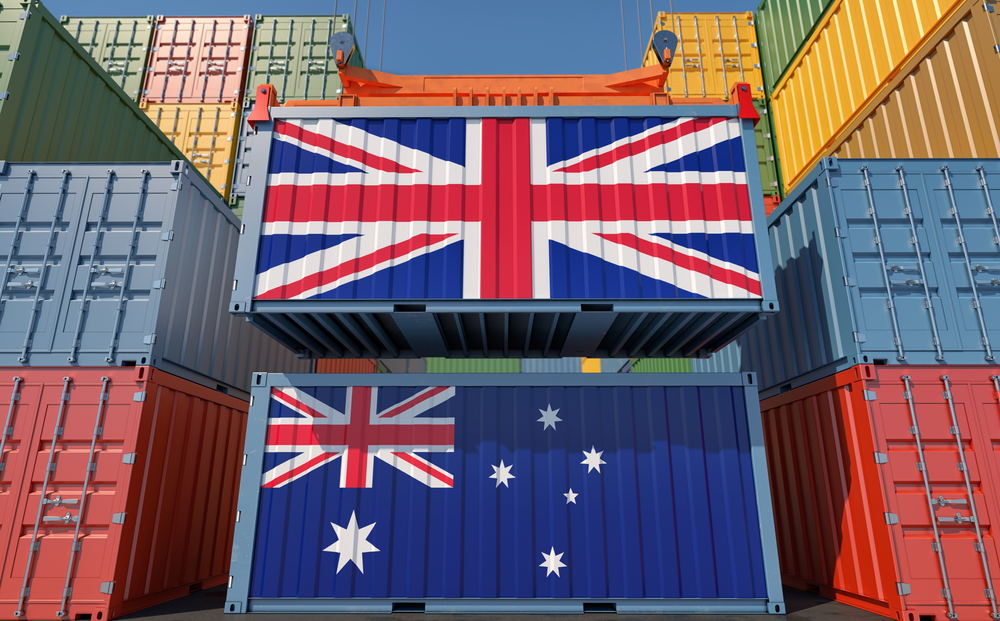 Australian and United Kingdom flags displayed on shipping containers.